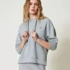 Felpa Over Con Charm Oval T