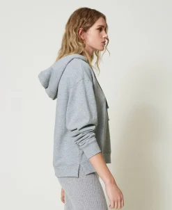 Felpa Over Con Charm Oval T