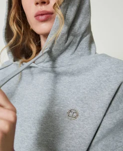 Felpa Over Con Charm Oval T