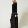 Pantaloni A Palazzo In Georgette Plissé