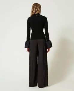 Pantaloni A Palazzo In Georgette Plissé