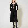 Pantaloni Cropped Con Cinturino Oval T