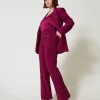 Pantaloni Flare Con Catena Oval T