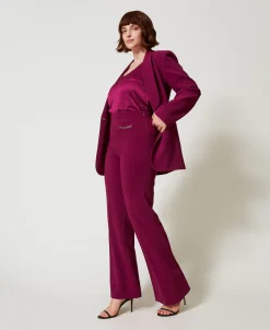 Pantaloni Flare Con Catena Oval T