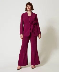 Pantaloni Flare Con Catena Oval T