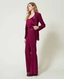 Pantaloni Flare Con Catena Oval T