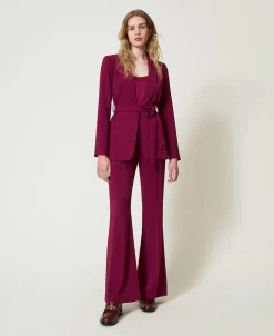 Pantaloni Flare Con Catena Oval T