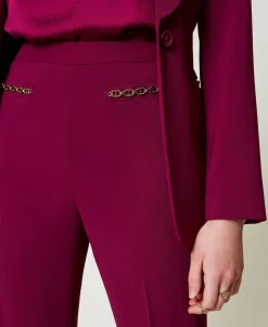 Pantaloni Flare Con Catena Oval T