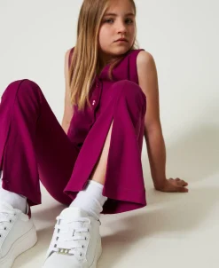 Pantaloni Flare Con Spacco