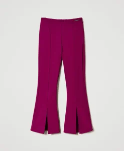 Pantaloni Flare Con Spacco