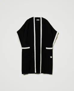 Poncho In Maglia Con Tasche
