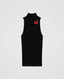 Top In Maglia A Righe Con Spilla