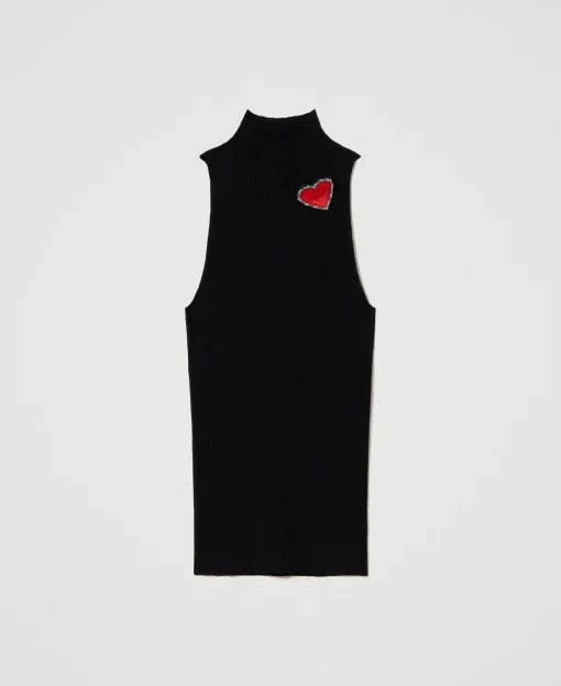 Top In Maglia A Righe Con Spilla