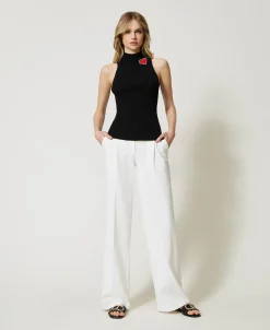 Top In Maglia A Righe Con Spilla